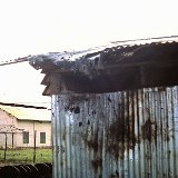 "Results of a Rocket Attack on French Plantation Building - Quan Loi - August 1967 - ABtry 6/27th Arty"